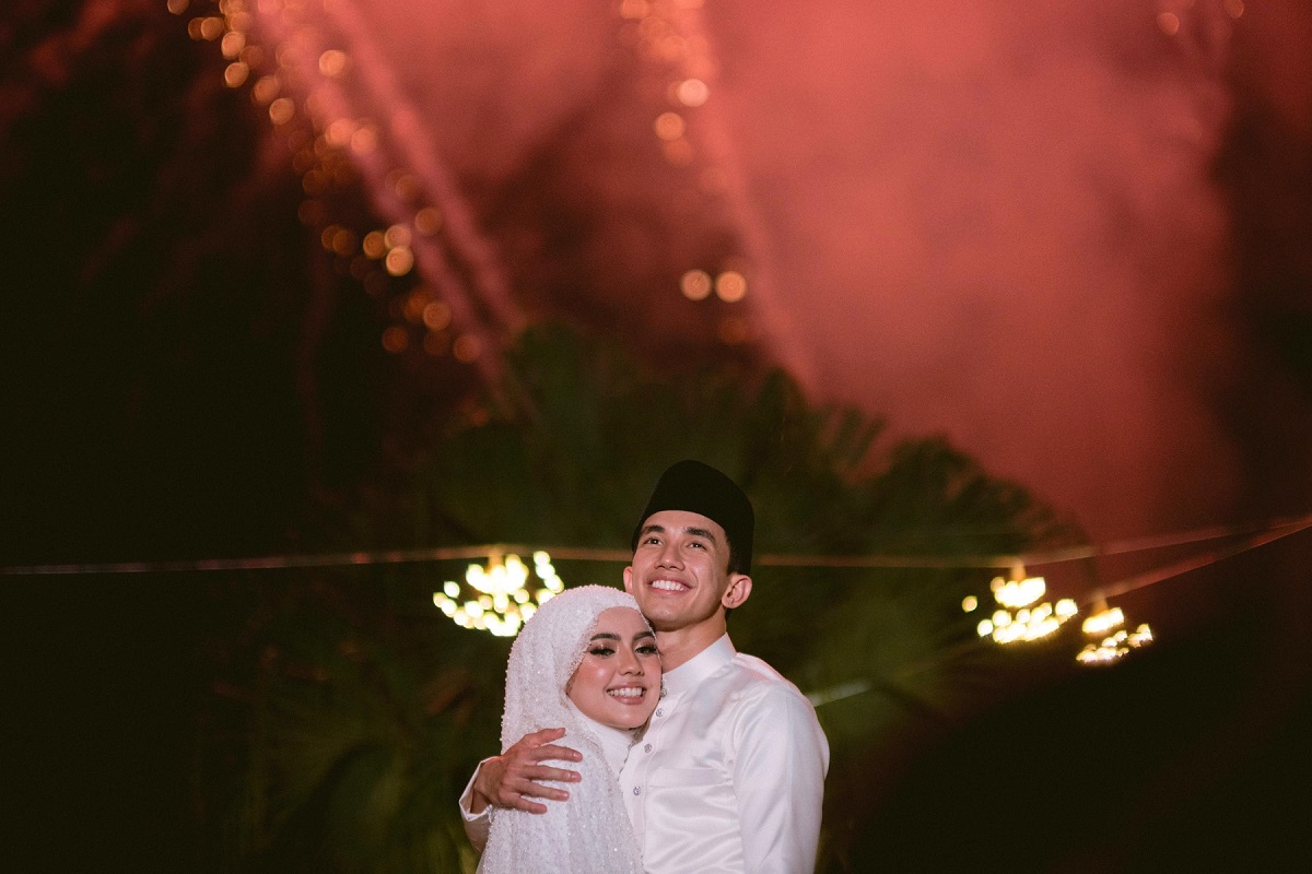 Imran Aqil dan isteri, Dahlia Rizal selepas majlis pernikahan mereka baru-baru ini. Gambar 4U Entertainment