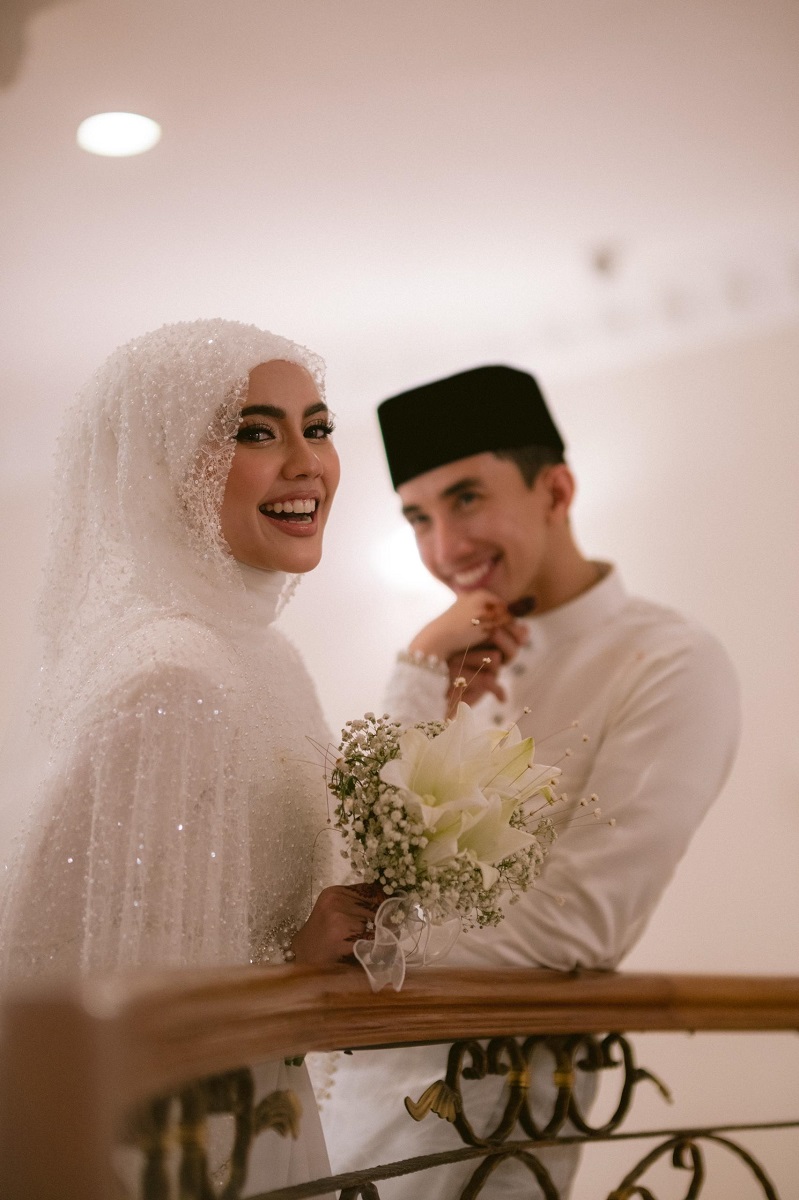 Imran Aqil dan isteri, Dahlia Rizal selepas majlis pernikahan mereka baru-baru ini. Gambar 4U Entertainment