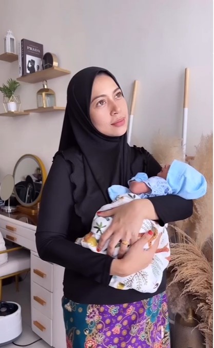 Syura kini sedang berpantang anak keempat.