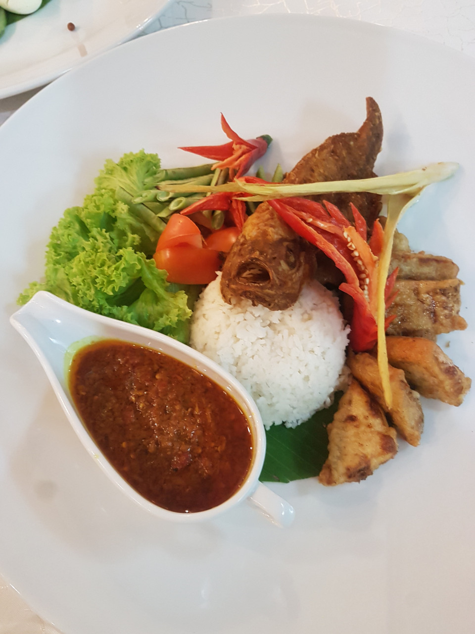 Talapia sambal di Ipoh. Gambar: Shah Shamshiri