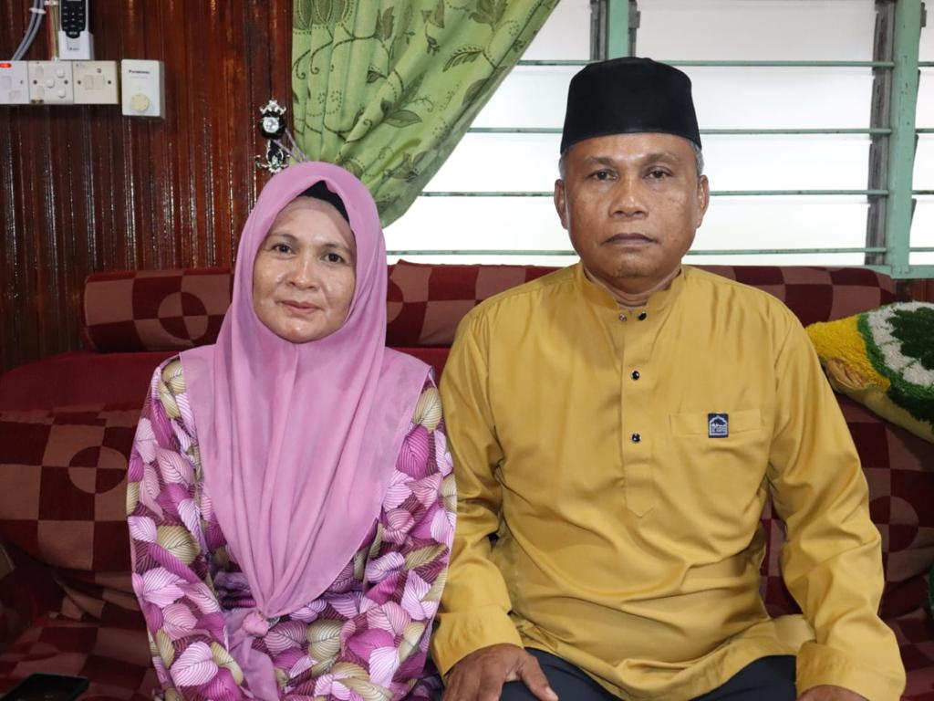 Doa Yuga dan Inawati mengiringi kejayaan Sazzlan merangkul emas di Sukan SEA Hanoi.