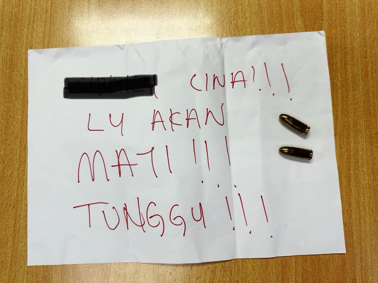 Surat ugutan yang dihantar kepada Teresa Kok. - Gambar Facebook
